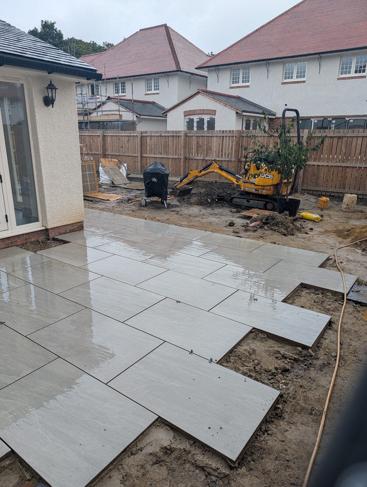 Excavator and materials during site preparation