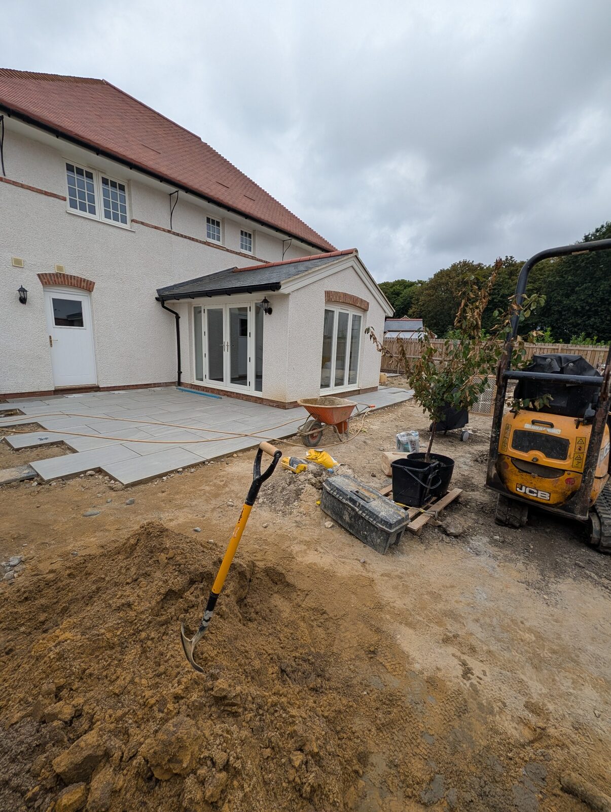 Paving and prepared areas developing around the house