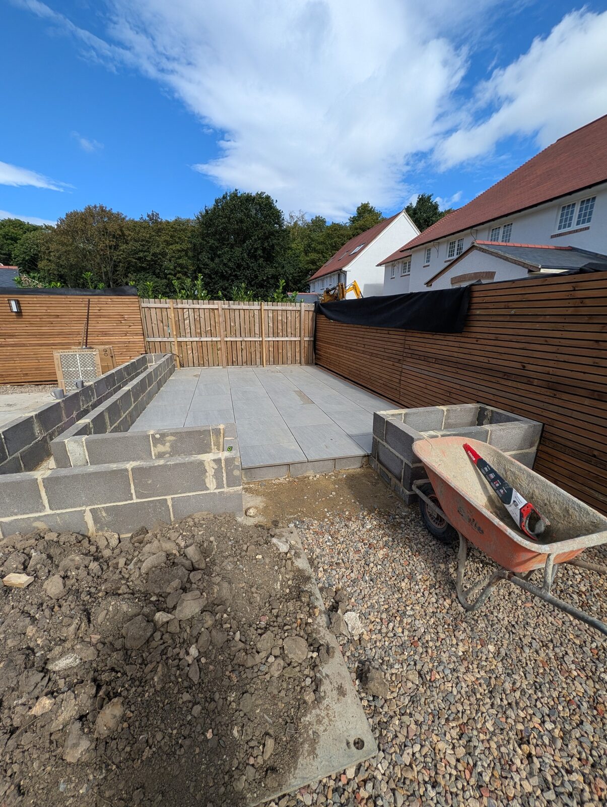 Paving installation across the developing garden