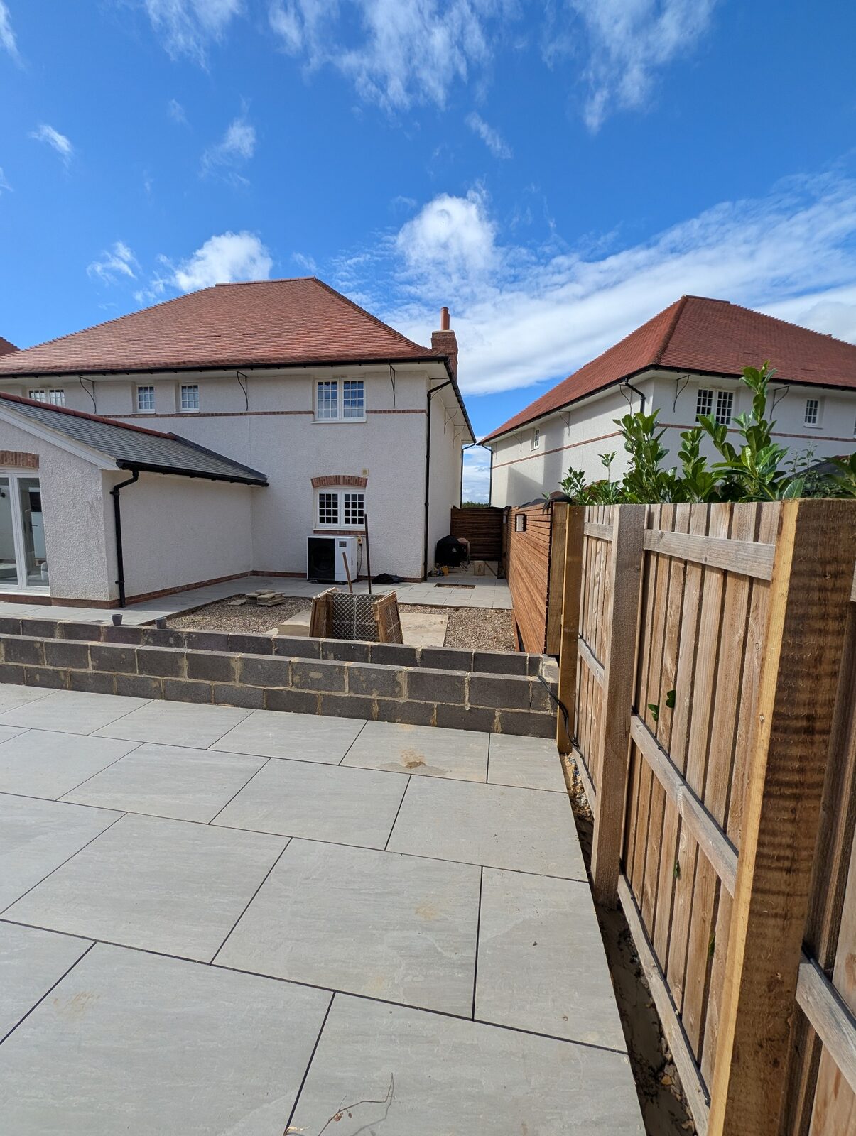 Finished paving lines framed by timber screening