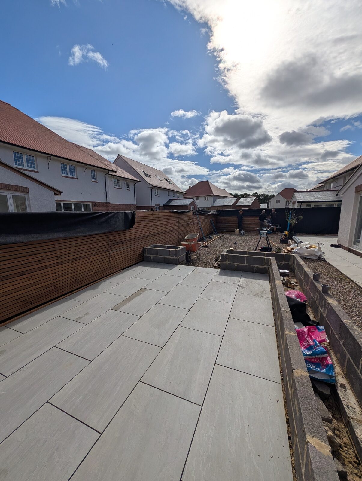 Latest progress across the paved side garden