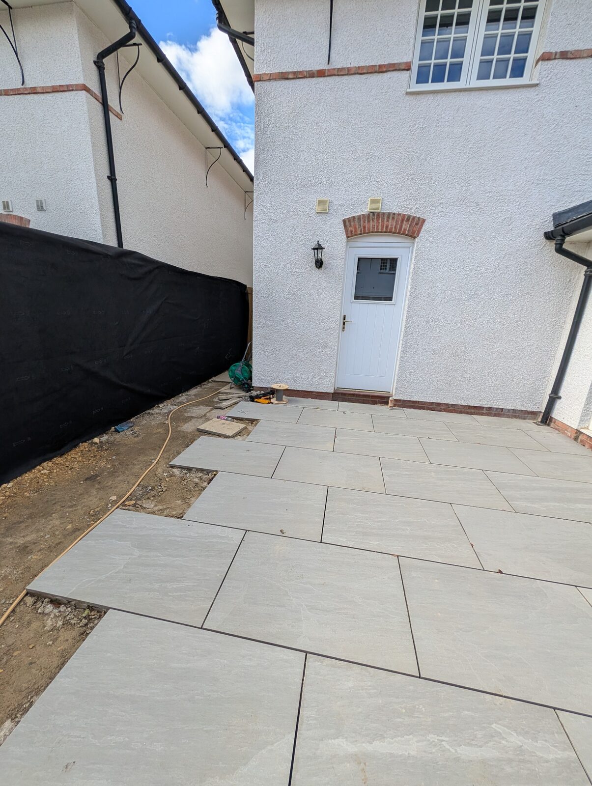 Detailed paving work beside the property